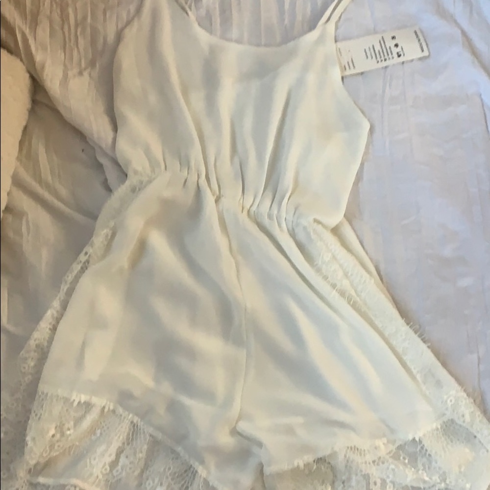 White romper with lace